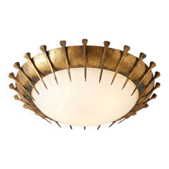 Lampe soleil en fer forgé, feuille d'or et verre, France, années 1950.