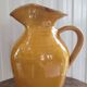 Large vintage enamelled terracotta pitcher