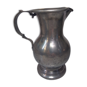 Old tin pitcher