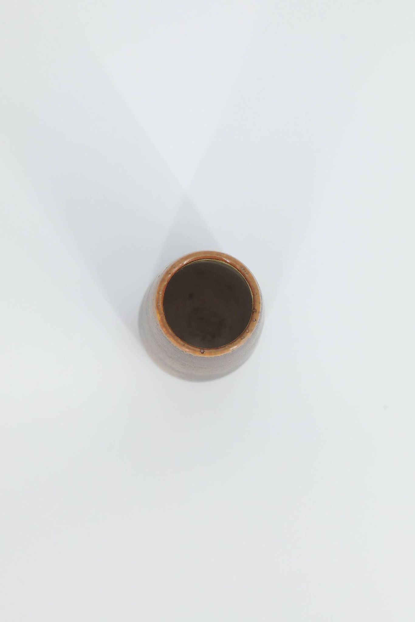 Small modern Scandinavian collection vase in chocolate stoneware from the mid-century by Gunnar Borg.