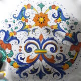 Old cup colored in Deruta faïence