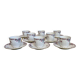 18-piece porcelain coffee set signed "Aux Lions de Faïence Paris"