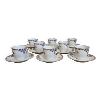 Service à café en porcelaine 18 pièces signé "Aux Lions de Faïence Paris"