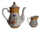 Golden porcelain teapot and coffee pot set with floral design and matching milk jug.