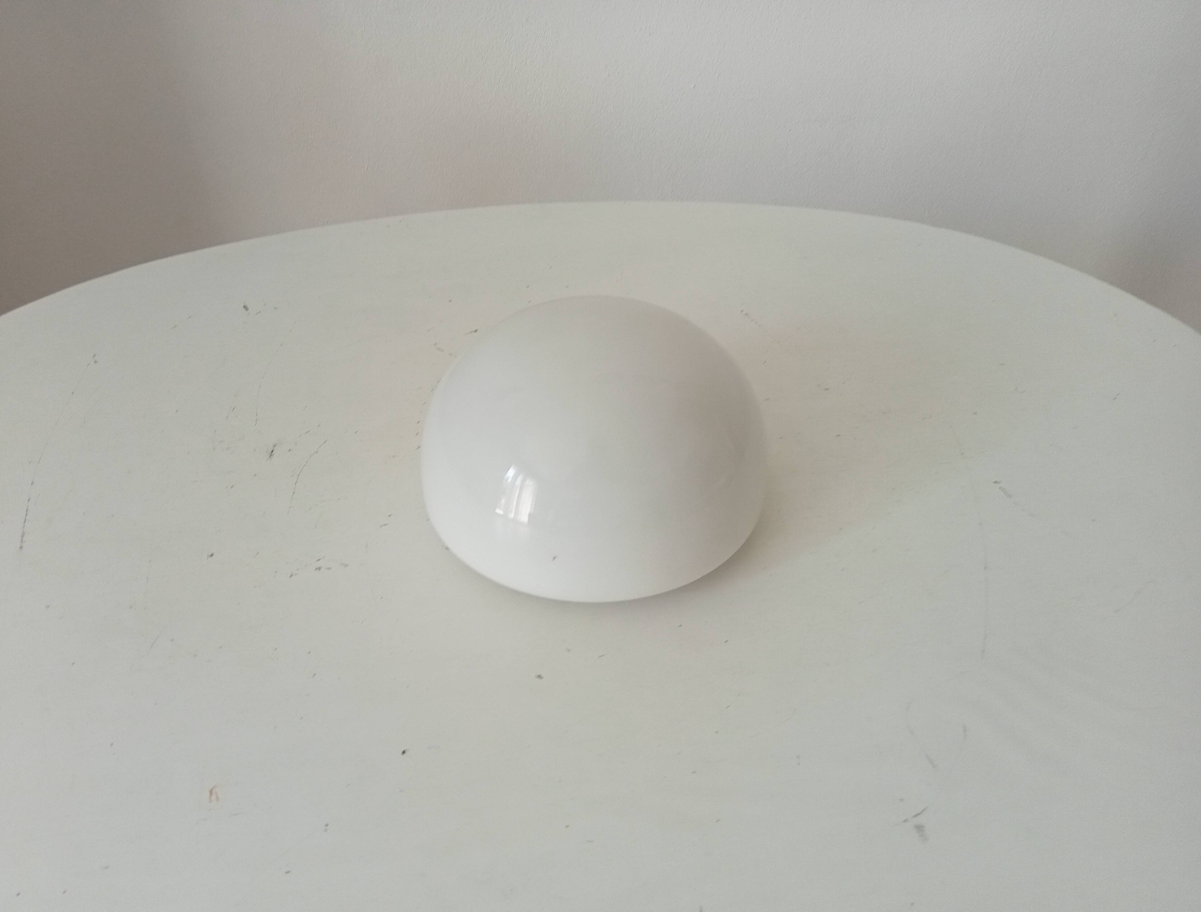 Vintage opaline wall light from the 1960s.