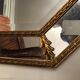 Miroir octogonal en bois doré biseauté  92x71cm