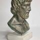 Bust of Esculape in patinated plaster on marble base, 21 cm