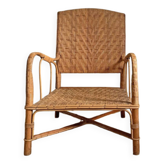 Large armchair in woven rattan and bamboo structure