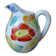 Old small jug, handmade ceramic milk pot with hand-painted floral decoration in the Vallauris style.