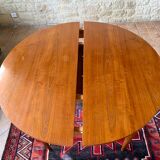 Expandable teak dining table, butterfly extension, circa 60s