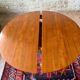 Expandable teak dining table, butterfly extension, circa 60s