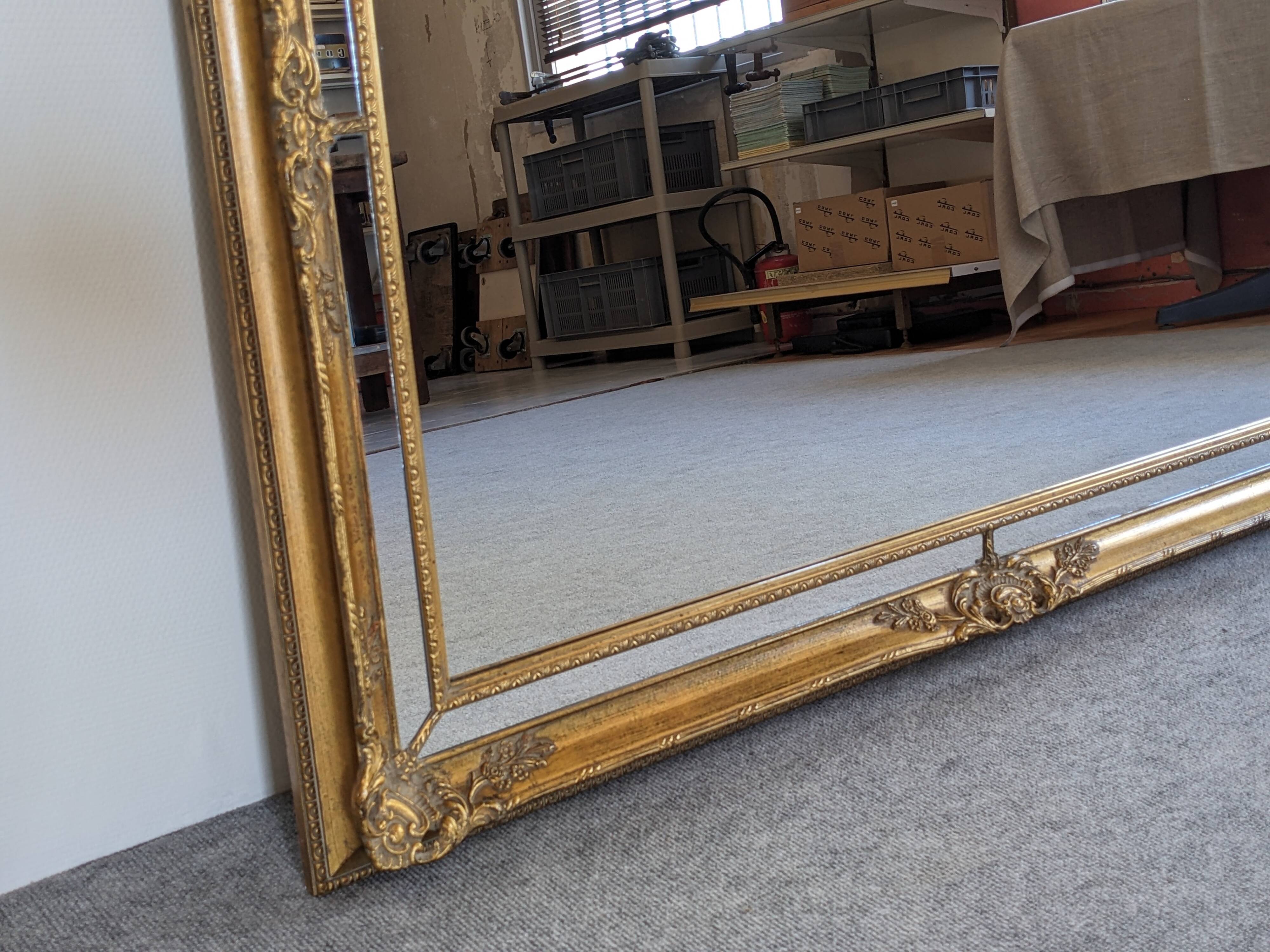 Louis XV style beaded mirror in gilded wood 115x85 cm