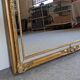 Louis XV style beaded mirror in gilded wood 115x85 cm