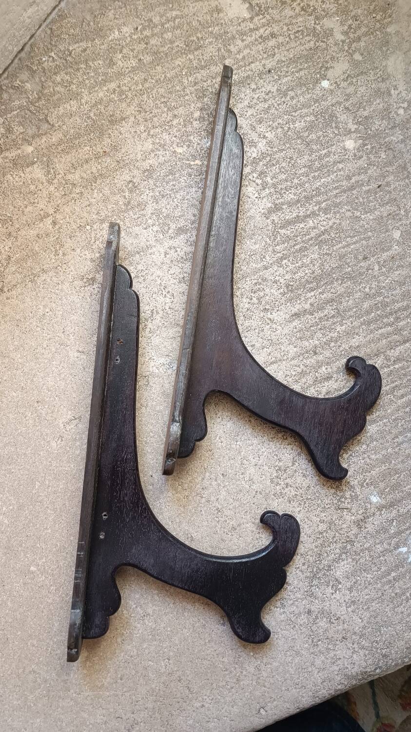 Old coat rack in blackened wood