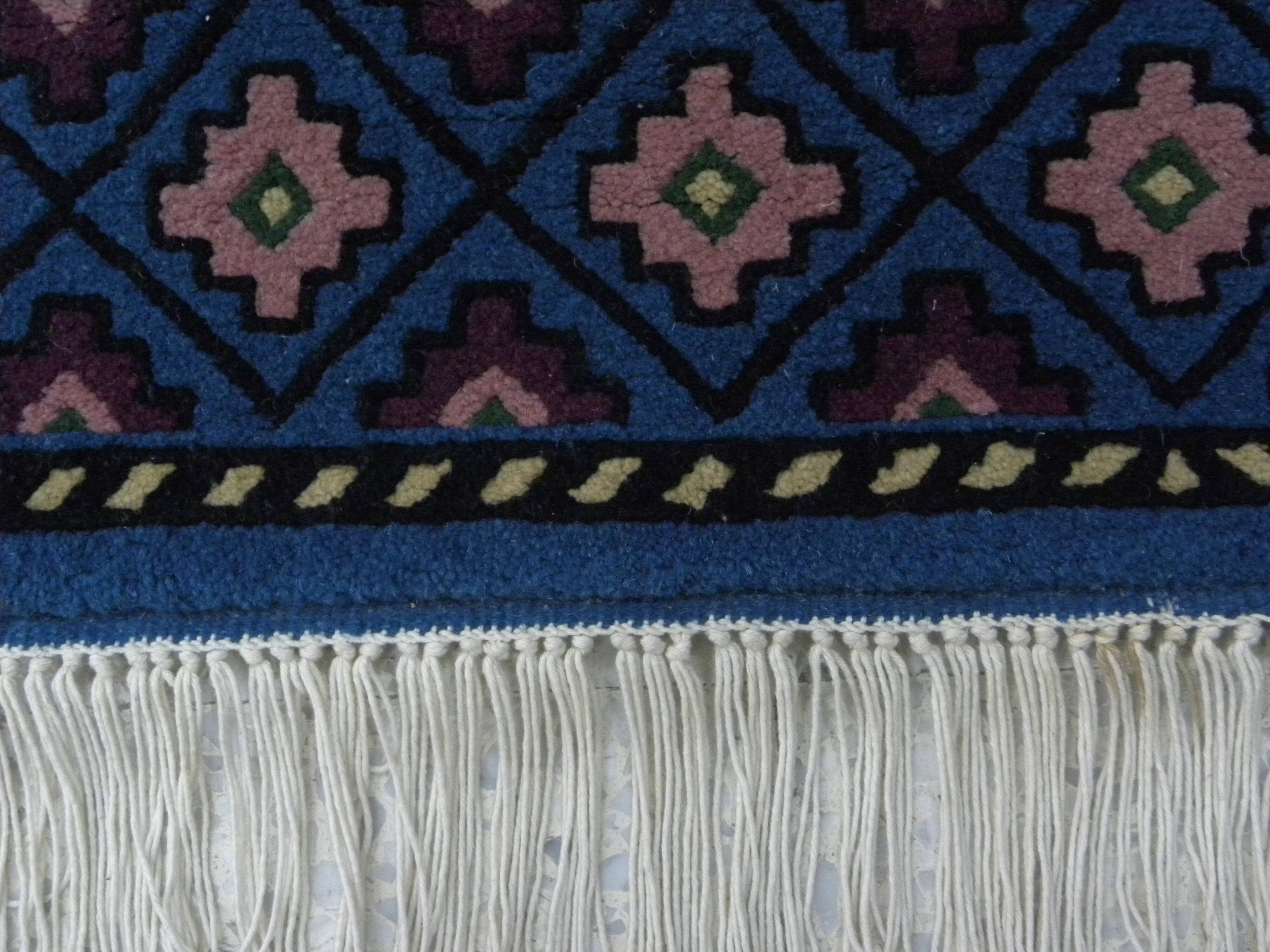 Vintage traditional Tunisian oriental rug in handmade blue wool.