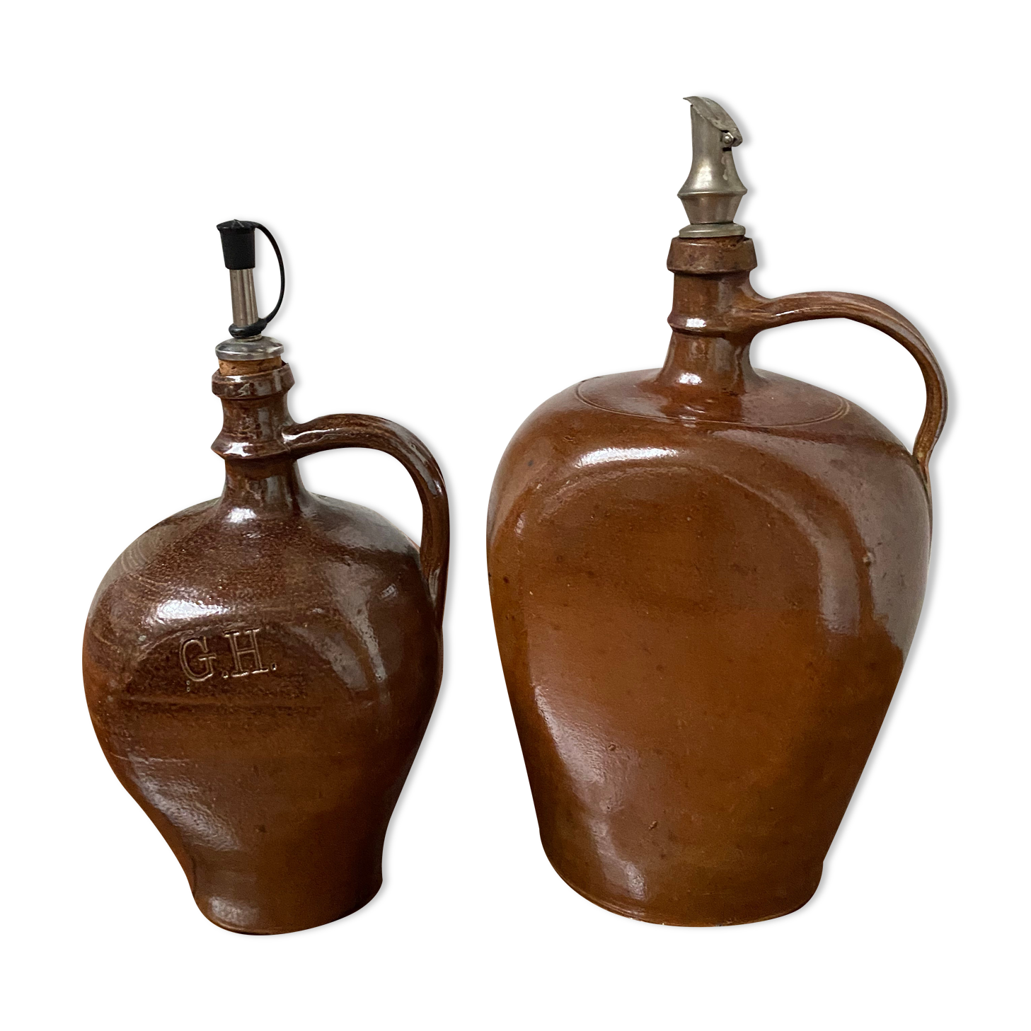 Pair of bottles in sandstone