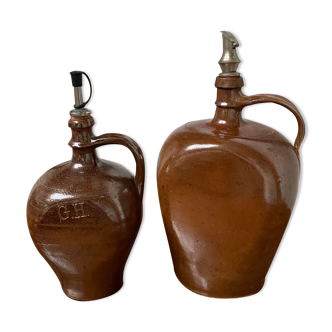 Pair of bottles in sandstone