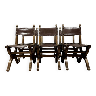 Series of 6 medieval style chairs in solid wood and leather from the 19th century circa 1850