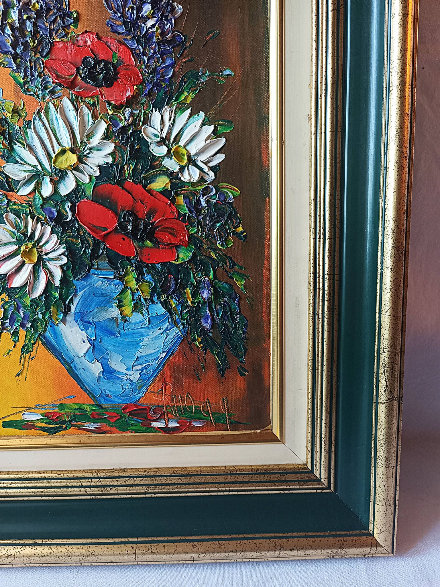 Oil painting on canvas, bouquet of flowers in a framed vase, signed.