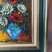Oil painting on canvas, bouquet of flowers in a framed vase, signed.