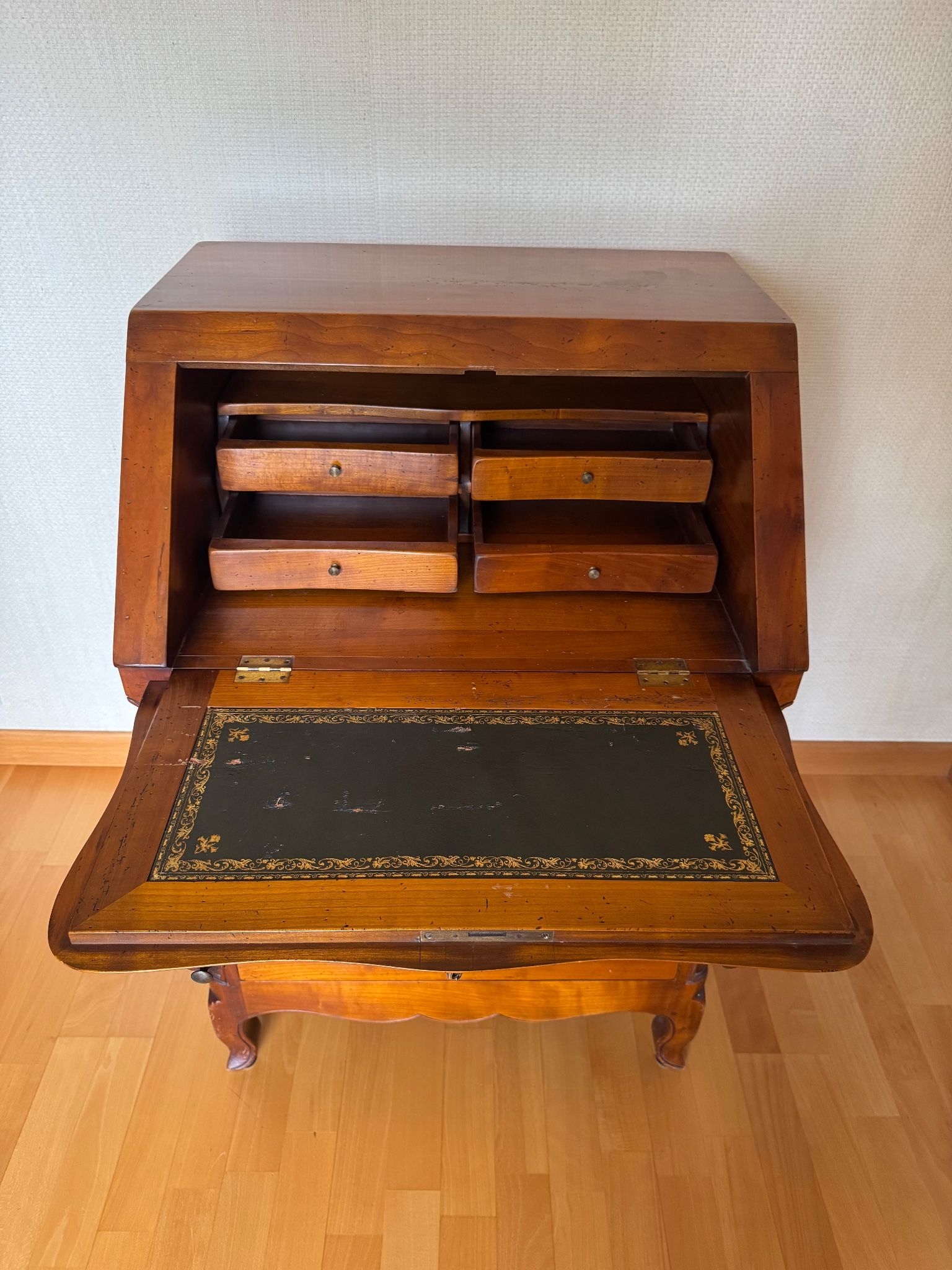 Secretary with drop-down front, signed Jean Laick, master cabinetmaker, cherry wood.