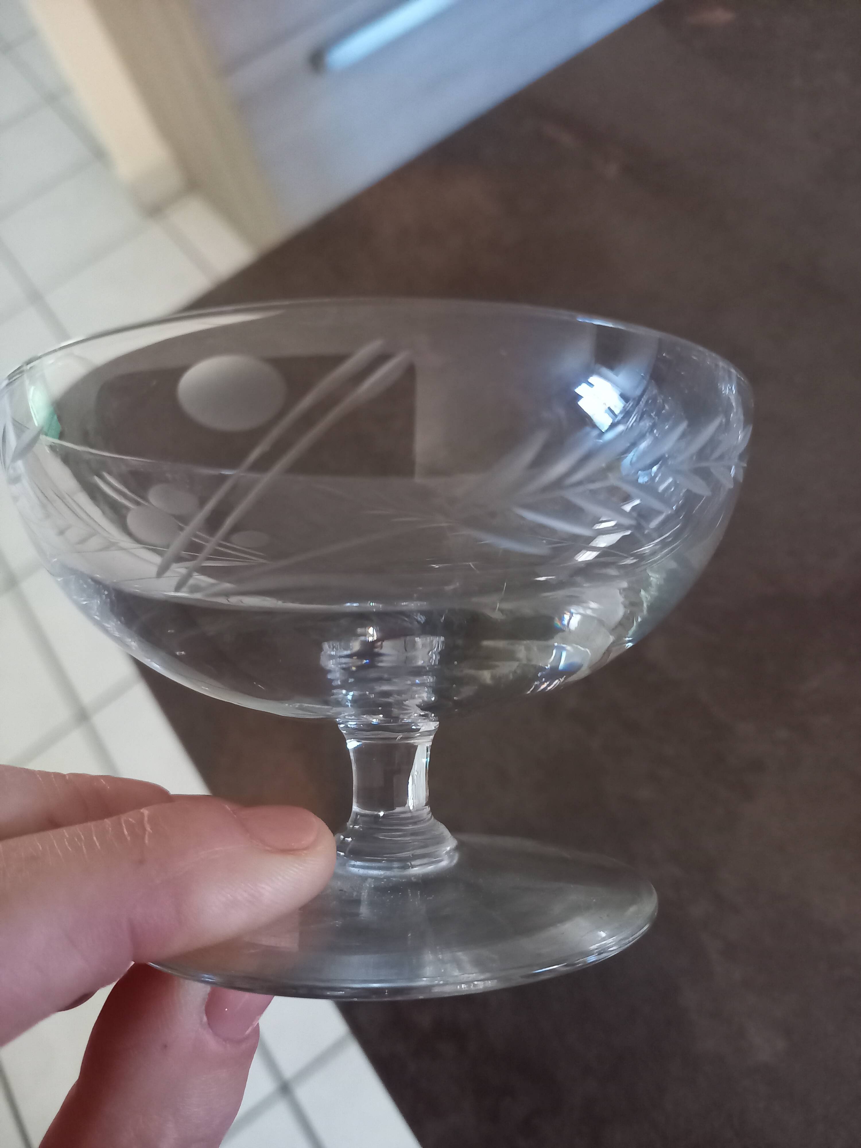 12 crystal champagne glasses engraved with a wheat stalk motif