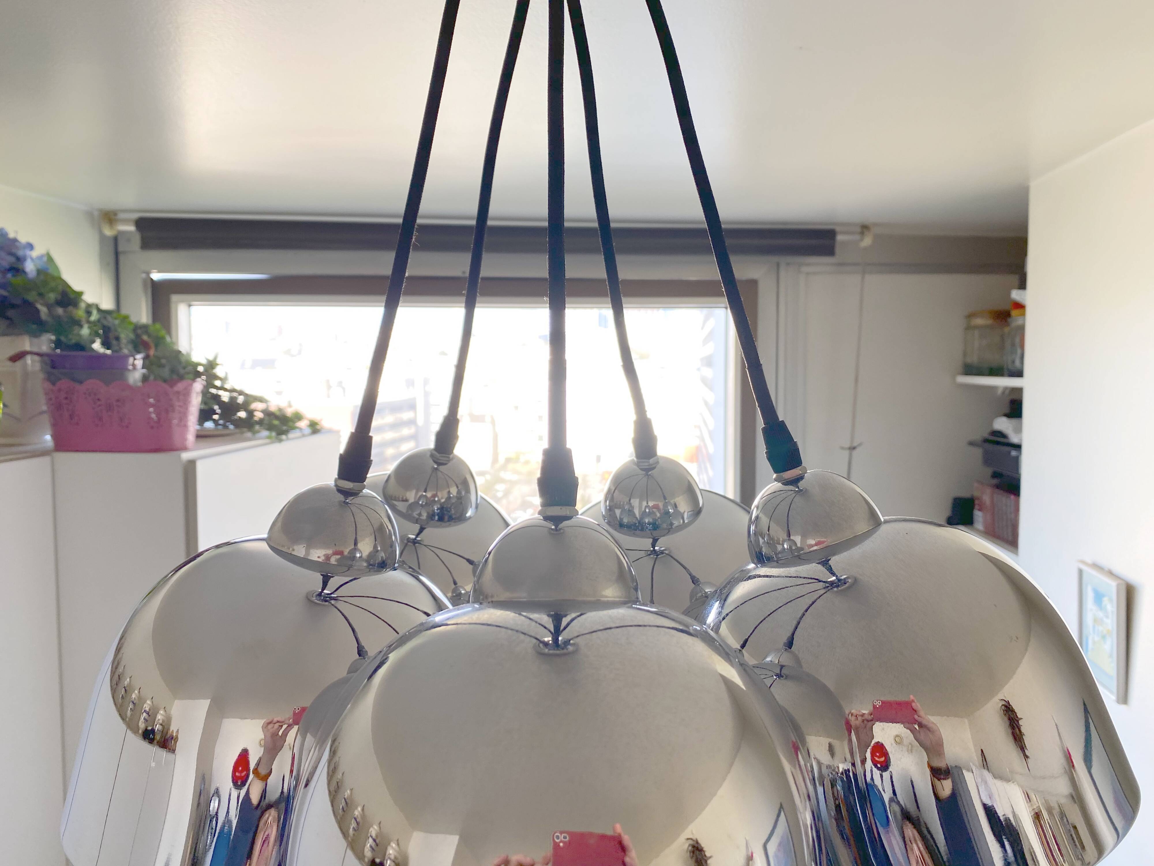 Suspended bell luminaires