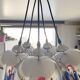 Suspended bell luminaires