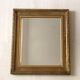Small wooden mirror with gilded stucco in the Louis XVI style.