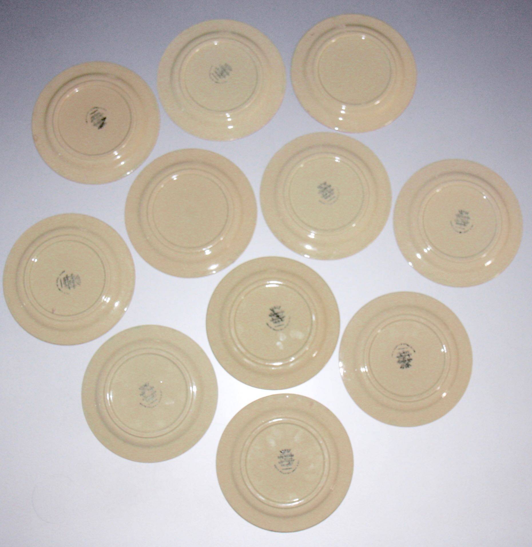 Eleven vintage plates in fine earthenware from Longchamp, Padua model.