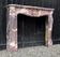 Louis XV style fireplace in peach blossom marble, circa 1880