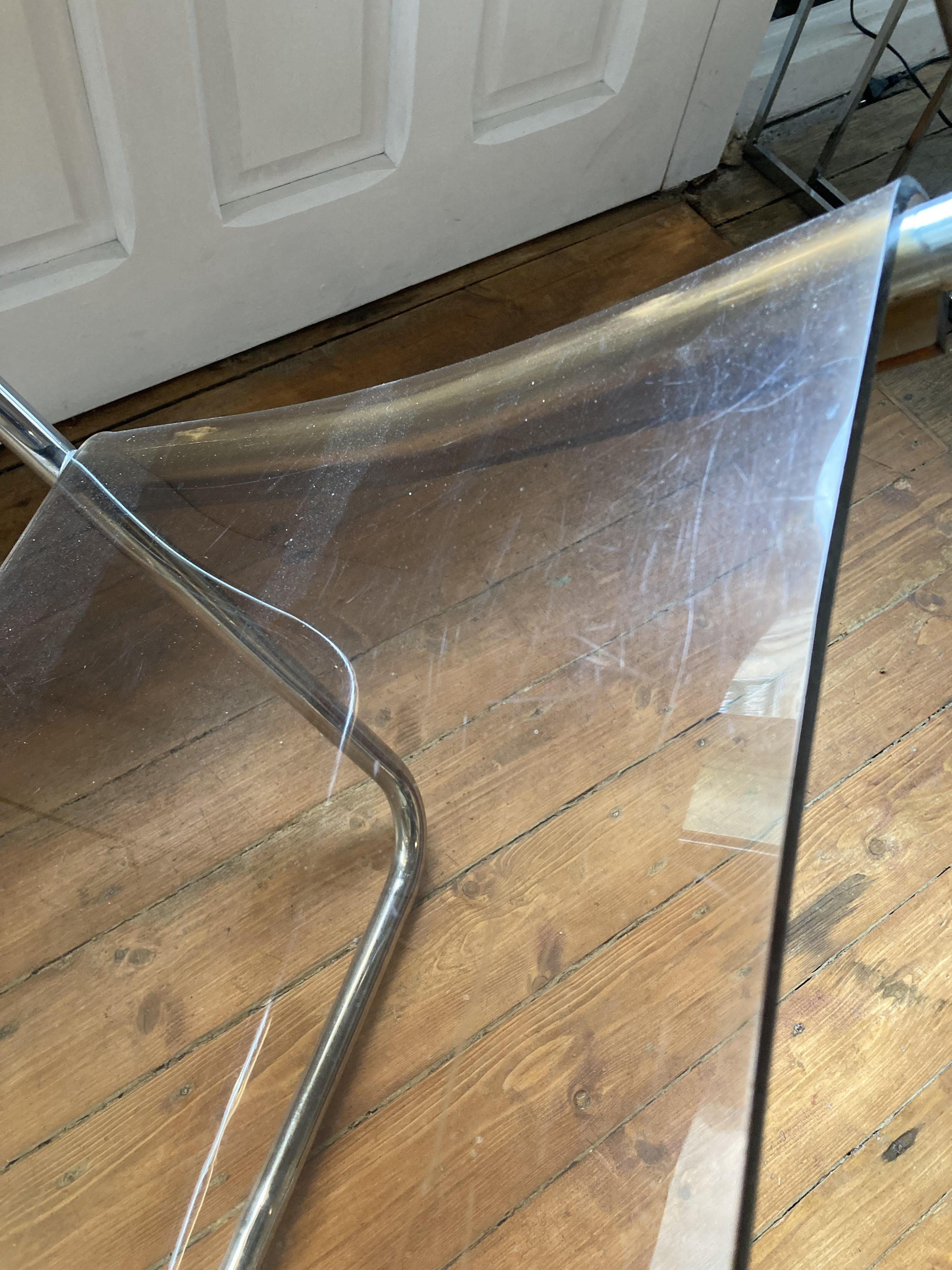 Armchair in chrome tubular metal and smoked plexiglass