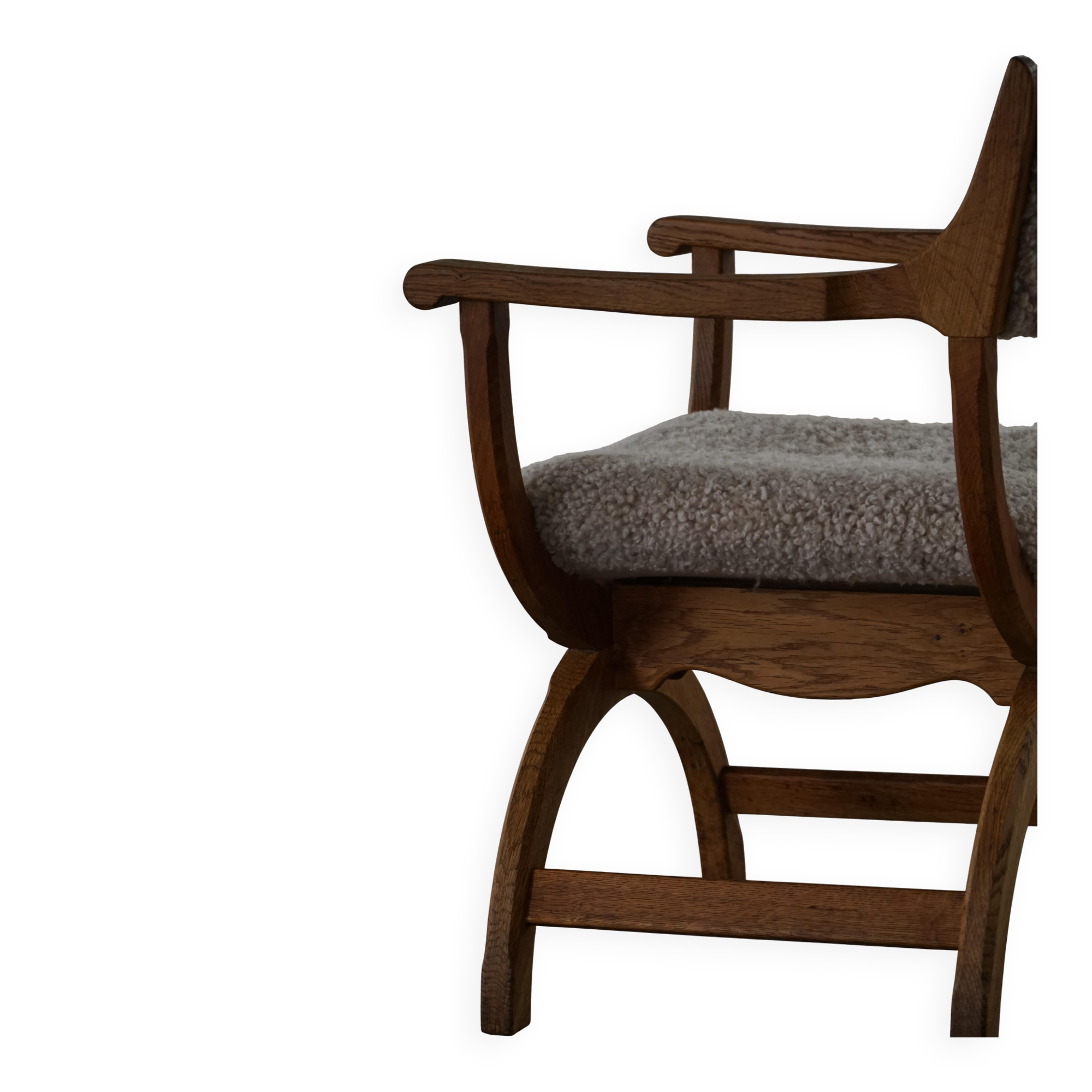Henning Kjærnulf, Oak and lambswool armchair, "Kurul" model, Mid-century, 1960s