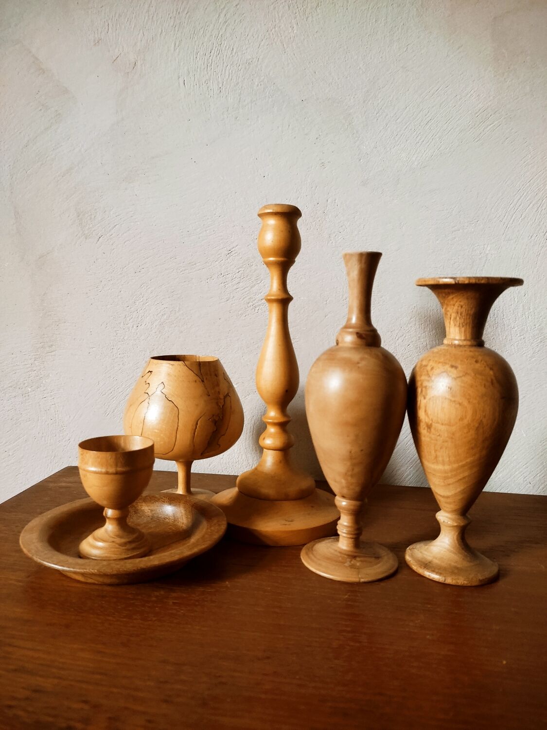 Composition of vases and cups in turned wood