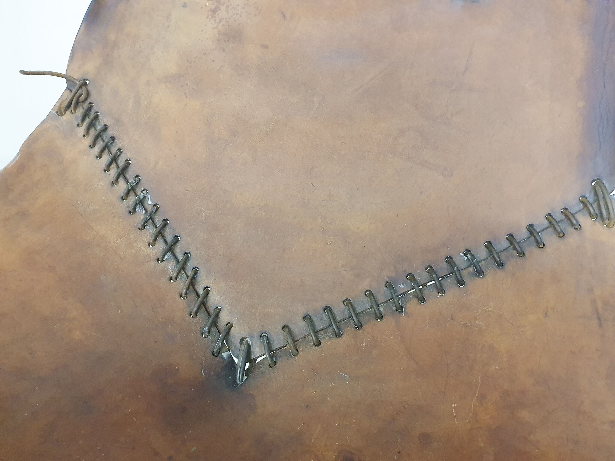 Set of two saddle leather lounge chairs, Brazil, 1960's