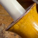 Candle holder-style lamp made entirely of ceramic.