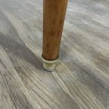 Dining table with tapered legs and solid exotic wood