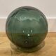 Floating fishing ball in glass