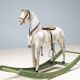Antique wooden rocking horse, vintage toy with original patina.