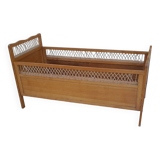 Vintage baby bed in wood and rattan from the 60s for children