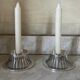 Pair of Keltum Pleet silver metal candlesticks