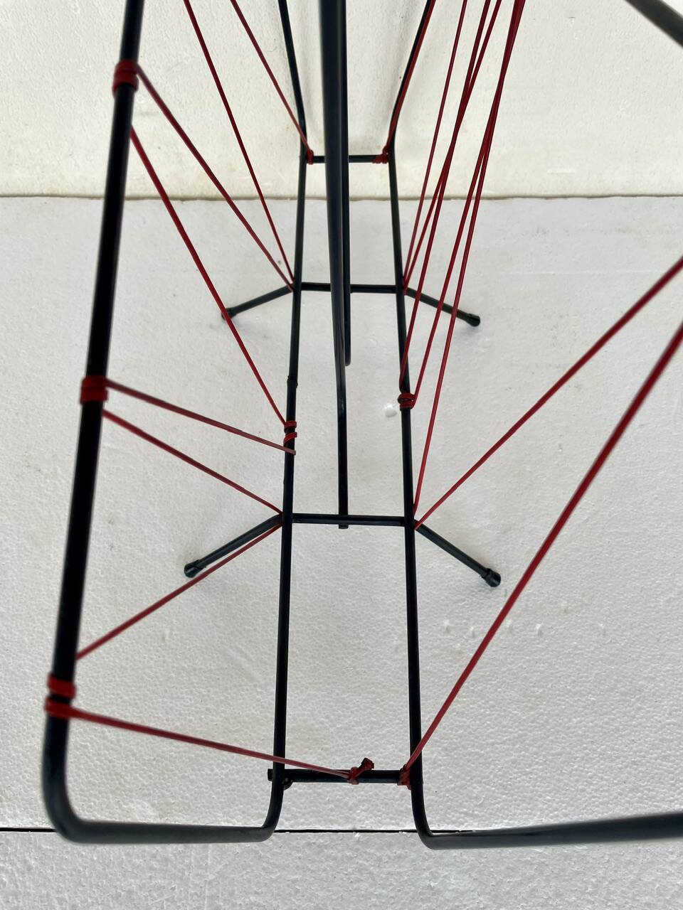 Vintage black metal magazine rack circa 19