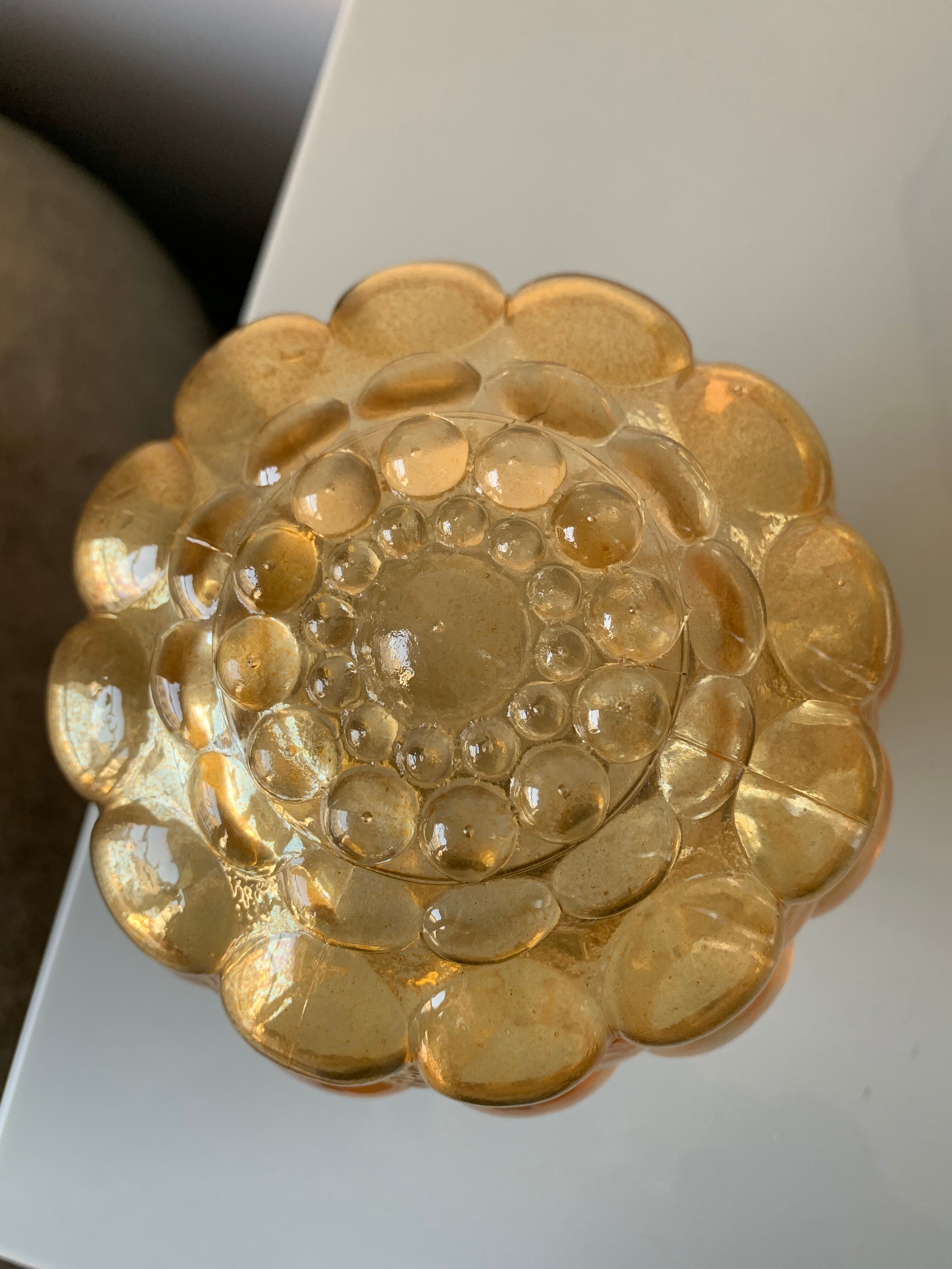 Old vintage table lamp made of amber molded glass