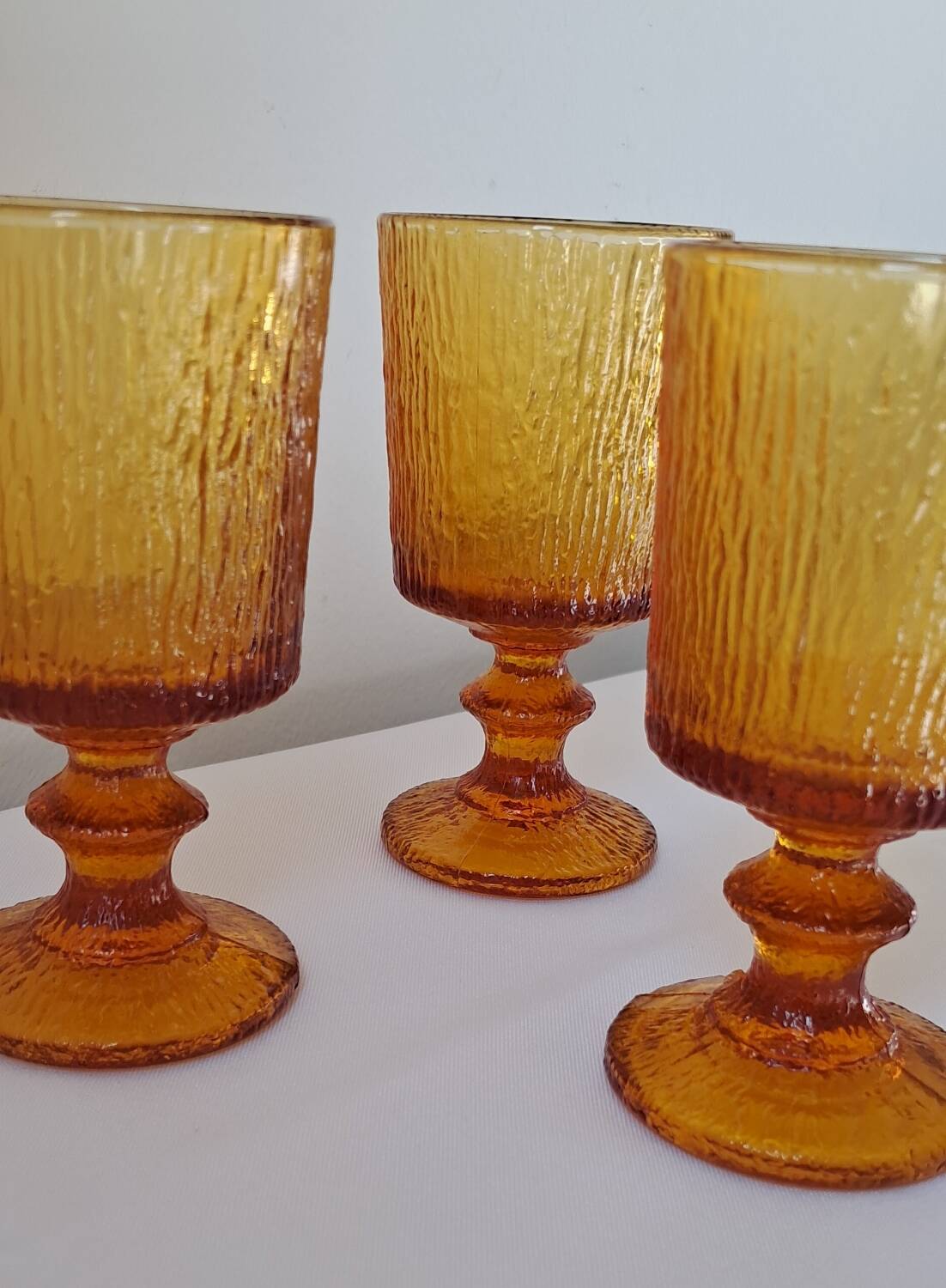 3 textured amber stemmed glasses. Vintage.