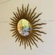 Miroir soleil doré 50cm années 70.