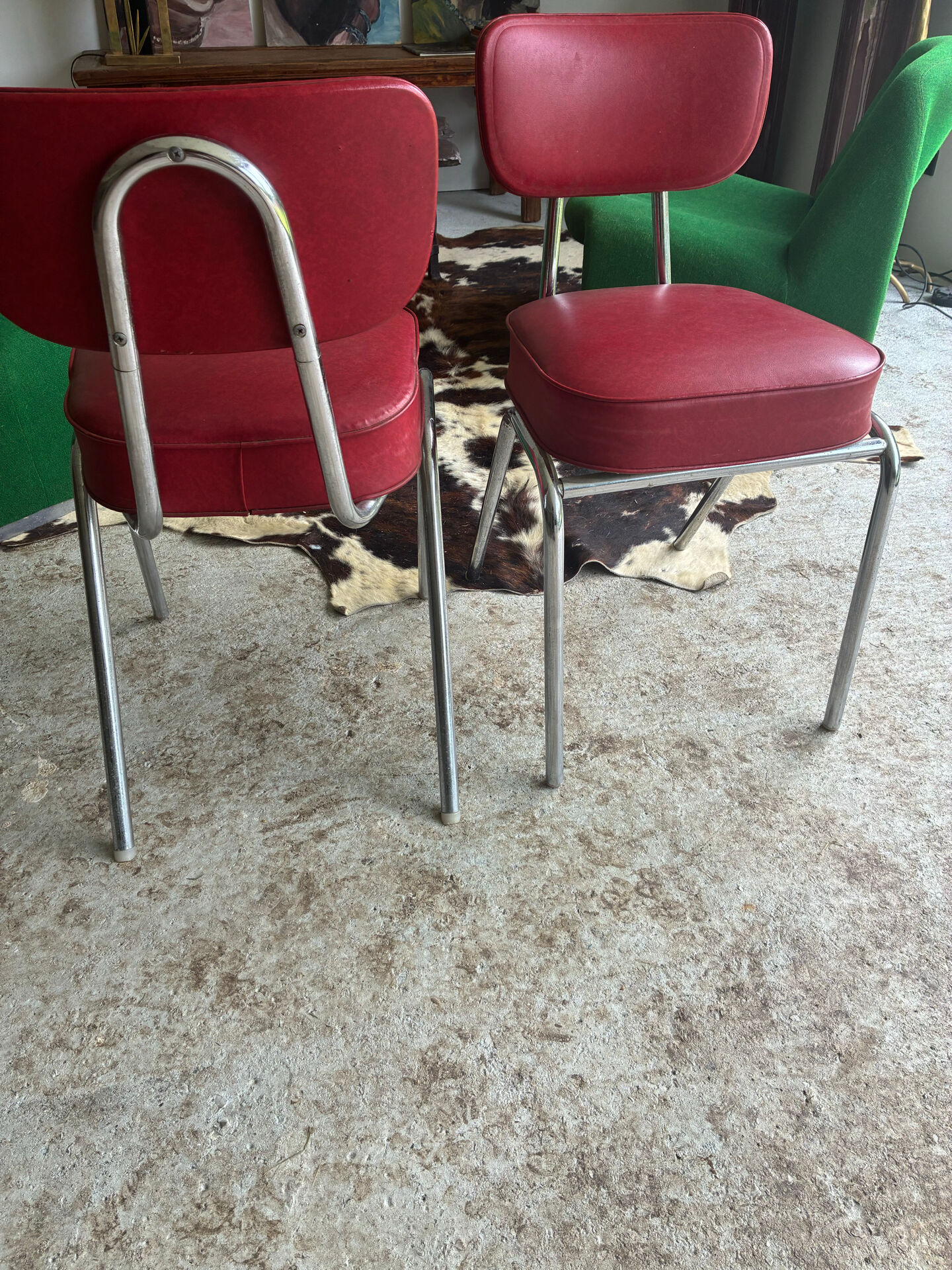 2 vintage red faux leather chairs