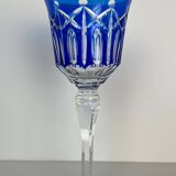 Set of twelve glasses in crystal tinted in different colours and cut with stars.