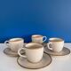 Speckled beige cup and saucer coffee set