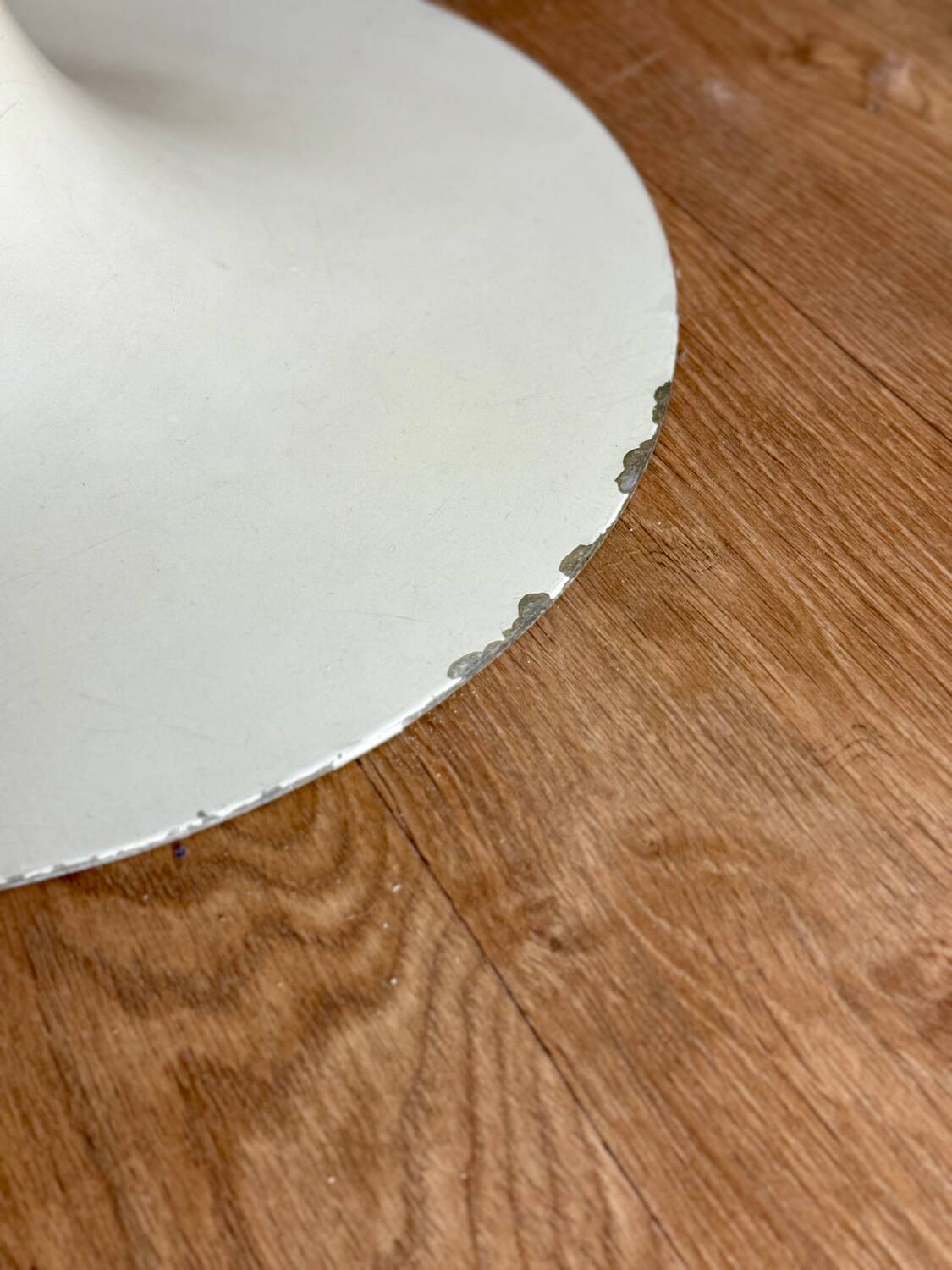 White round tulip-legged table attributed to Arkana