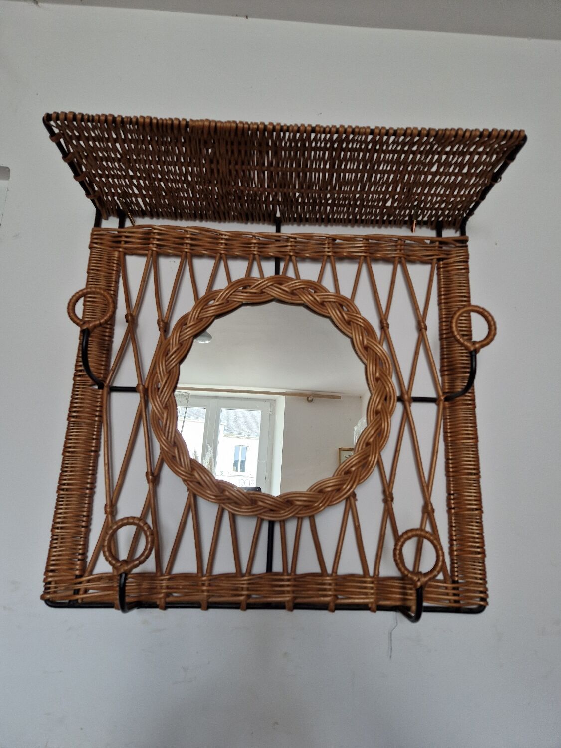 Woven wicker coat rack